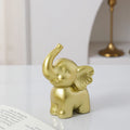 1pc Collectible figurine  , Simple modern black and gold elephant ornament home decor small sculpture.